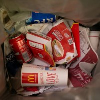 Photograph taken on November 19, 2015 shows fast food packaging inside a rubbish bin near Victoria Station in central London.