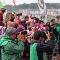 Photographers take photographs of a performance on the Other Stage during day five of Glastonbury Festival 2024 at Worthy Farm, Pilton on June 30,...
