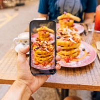 photographing brunch at the cafe with a smartphone, personal perspective view - food stock pictures, royalty-free photos & images