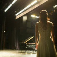 pianist walking toward to the stage - concert stock pictures, royalty-free photos & images