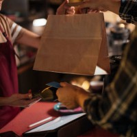 picking up food from a restaurant - junk food stock pictures, royalty-free photos & images