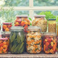 pickled organic vegetables in jars - food stock pictures, royalty-free photos & images
