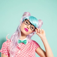 pink hair manga style girl holding nerd glasses - fashion stock pictures, royalty-free photos & images
