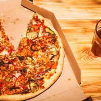 pizza and glass of craft beer on the wooden table - junk food stock pictures, royalty-free photos & images