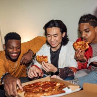 pizza at a house party - junk food stock pictures, royalty-free photos & images