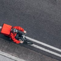 pizza delivery guy on bicycle - food stock pictures, royalty-free photos & images