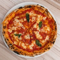 pizza,high angle view of pizza on table - junk food stock pictures, royalty-free photos & images