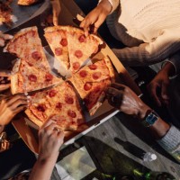 pizza party - junk food stock pictures, royalty-free photos & images