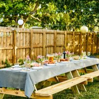 place setting on dining table in back yard - garden decoration stock pictures, royalty-free photos & images