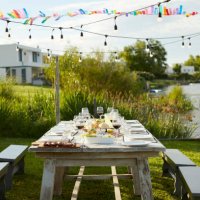 place setting on table during asado party in yard - garden decoration stock pictures, royalty-free photos & images
