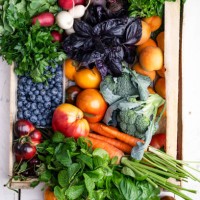 plant based food, fresh organic fruits, berries, vegetables, and herbs in wooden box, high angle view - food stock pictures, royalty-free photos & images