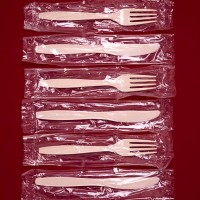 plastic knives and forks in wrappers - junk food stock pictures, royalty-free photos & images