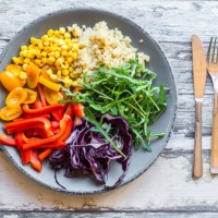 plate of rainbow salad with bulgur, rocket and different vegetables - junk food stock pictures, royalty-free photos & images