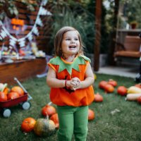 playful kids enjoying a halloween party - garden decoration stock pictures, royalty-free photos & images