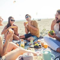 pleasant beach picnic with my friends - food stock pictures, royalty-free photos & images