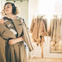 plus size woman choose fashioned dress in store. plus size women shopping. - fashion stock pictures, royalty-free photos & images