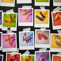 polaroids of shoes taped to wall - fashion stock-fotos und bilder