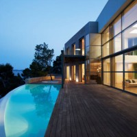 pool outside modern house at twilight - fashion stock pictures, royalty-free photos & images