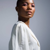 portrait beautiful, confident young woman with shaved head - fashion stock pictures, royalty-free photos & images