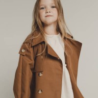 portrait of a beautiful girl with long blonde hair in an autumn trench coat on a white background - fashion stock pictures, royalty-free photos & images