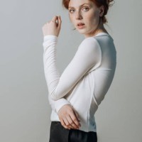 portrait of a beautiful red-haired girl look at the camera on a gray background studio shot. - fashion stock pictures, royalty-free photos & images