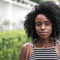 portrait of a beautiful young woman in a city - hairstyle stock pictures, royalty-free photos & images