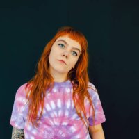 portrait of a cheeky young red-haired woman - hairstyle stock pictures, royalty-free photos & images