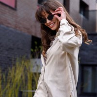 portrait of a fashionable business woman in glamorous sunglasses and trendy clothes on a city street in summer. fashion concept. - fashion stock pictures, royalty-free photos & images