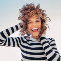portrait of a happy girl against blue sky - fashion stock pictures, royalty-free photos & images