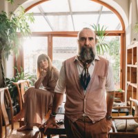 portrait of a mid adult couple in their home office - fashion stock pictures, royalty-free photos & images