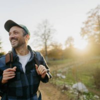 portrait of a mid adult male hiker - travel stock pictures, royalty-free photos & images