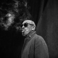 portrait of a smoking man. - fashion stock pictures, royalty-free photos & images