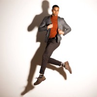 portrait of a young handsome male jumping in studio - fashion stock pictures, royalty-free photos & images