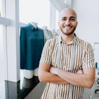 portrait of a young male stylist small company atelie looking at camera - fashion stock pictures, royalty-free photos & images