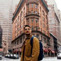 portrait of a young man in eyeglasses on the street in new york city, usa - travel stock pictures, royalty-free photos & images