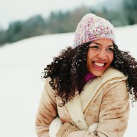 portrait of a young woman wearing a hat in the snow - fashion stock pictures, royalty-free photos & images