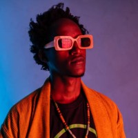 portrait of african-american man in neon ight - fashion stock pictures, royalty-free photos & images