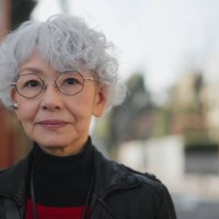 portrait of beautiful and confident asian senior woman in city - fashion stock pictures, royalty-free photos & images