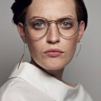 portrait of beautiful young woman wearing glasses & looking in camera - fashion stock pictures, royalty-free photos & images