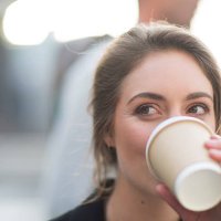portrait of businesswoman drinking coffee to go - junk food stock pictures, royalty-free photos & images