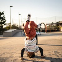 portrait of child boy breakdancing at skateboard park - fashion stock pictures, royalty-free photos & images