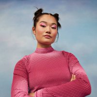 portrait of confident teenage girl with arms crossed against colored background - hairstyle stock pictures, royalty-free photos & images