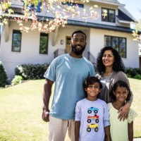 portrait of family in front of home - home decoration stock pictures, royalty-free photos & images