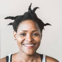 portrait of female athlete smiling and looking into camera - hairstyle stock pictures, royalty-free photos & images