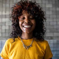 portrait of female skateboarders in warehouse environment - fashion stock pictures, royalty-free photos & images