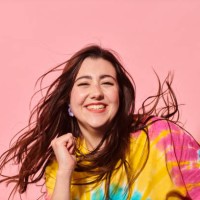 portrait of happy, confident young woman dancing - fashion stock pictures, royalty-free photos & images