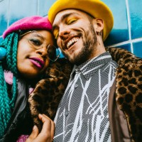 portrait of happy young man with mid adult woman - fashion stock pictures, royalty-free photos & images