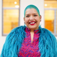 portrait of hispanic lesbian woman with blue dyed hair looking at camera - fashion stock pictures, royalty-free photos & images