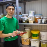 portrait of male manager doing the inventory at the storage room - food stock pictures, royalty-free photos & images