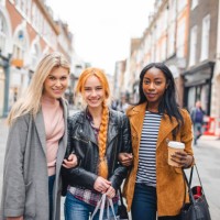 portrait of three young women shopping in the center of london - fashion stock pictures, royalty-free photos & images